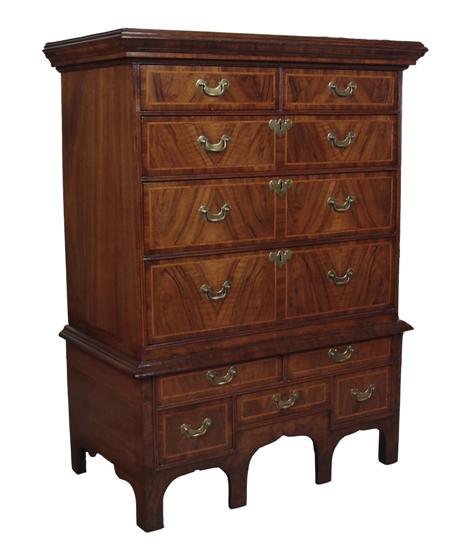 Appraisal: An th century walnut highboy the projected moulded cornice above