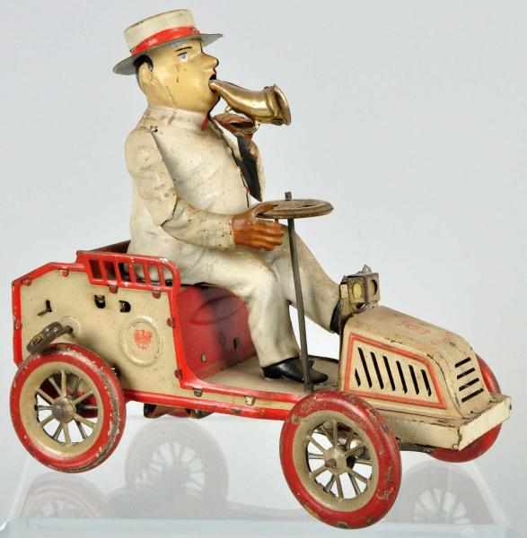 Appraisal: Tin Lehmann Tut Tut Car Wind-Up Toy Description German Bellows