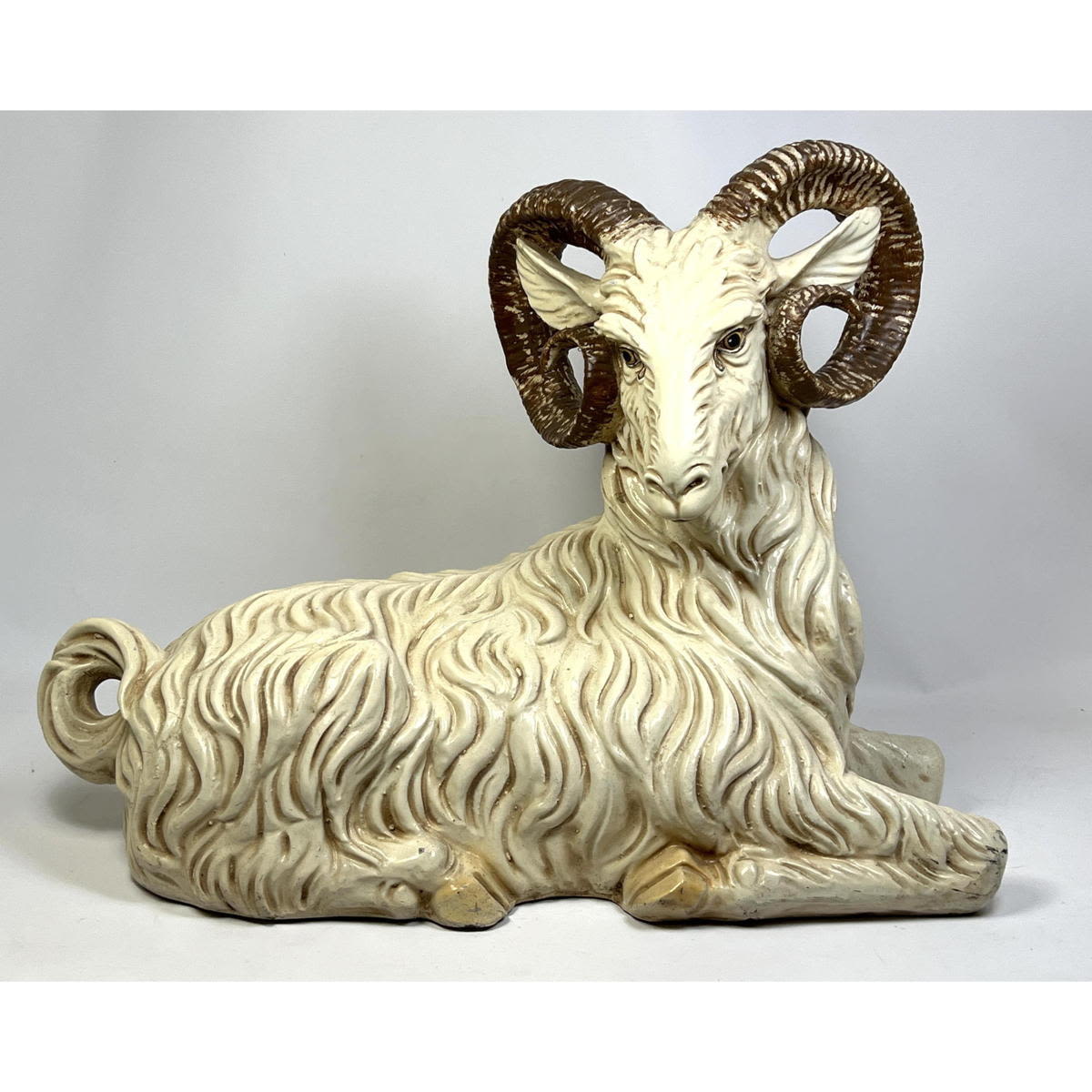 Appraisal: Hollow resin Figural sculpture of Lying Ram Dimensions H inches