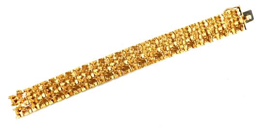 Appraisal: JEWELRY K yellow gold bracelet nugget finish with hinged links