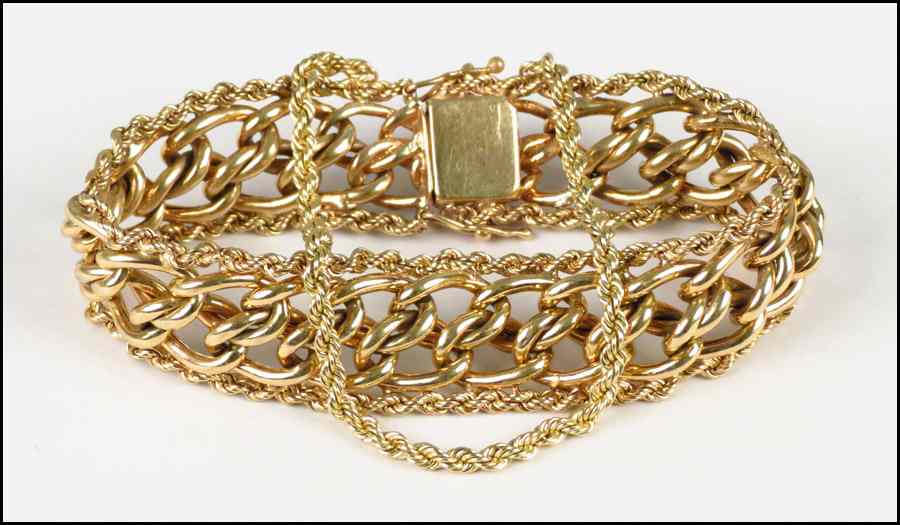 Appraisal: KARAT YELLOW GOLD ROPE AND LINK BRACELET Length '' Wt