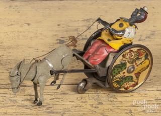 Appraisal: Lehman tin wind-up donkey and clown cart '' l