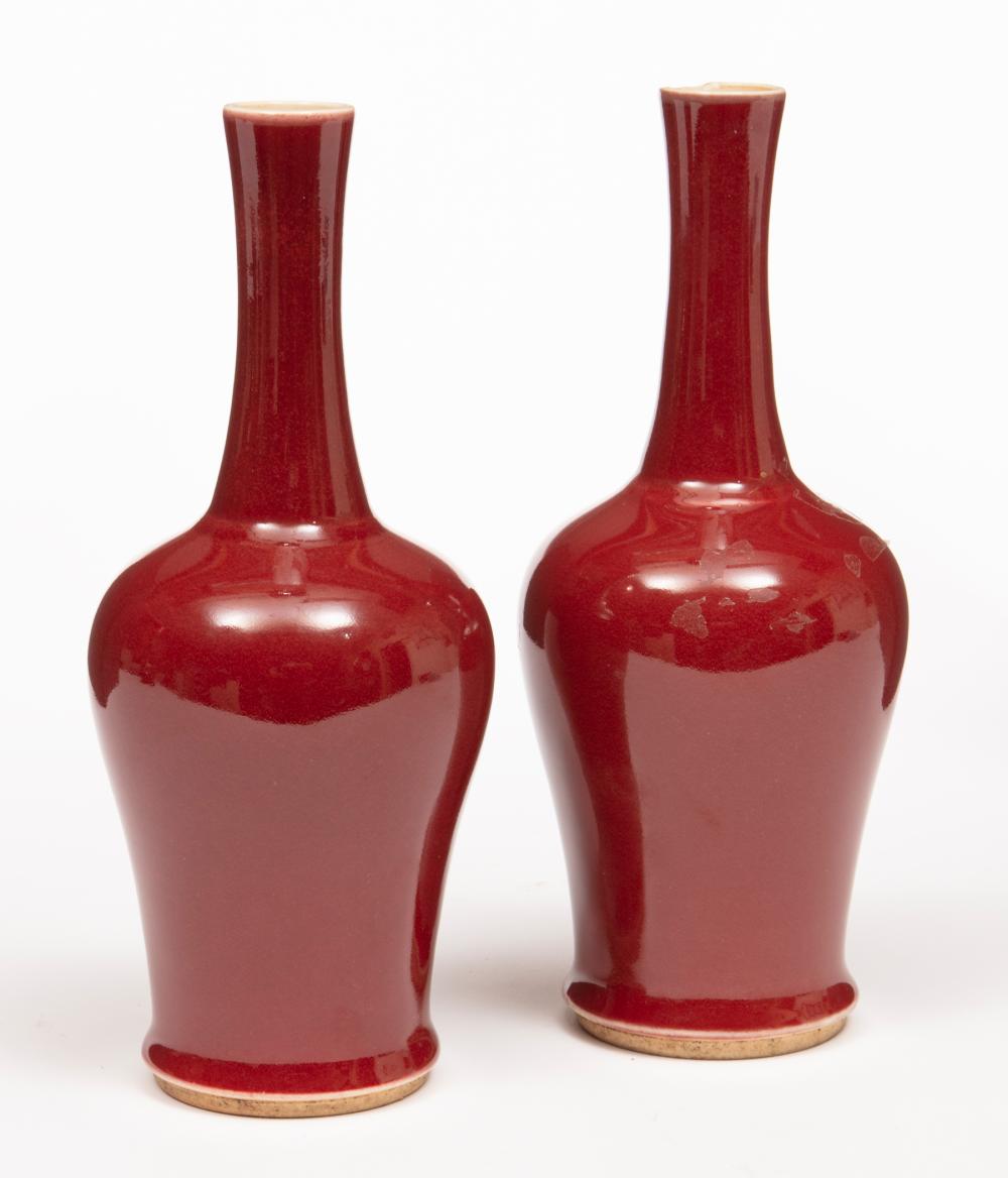 Appraisal: Pair of Chinese Oxblood Glazed Porcelain Bottle Vases th c