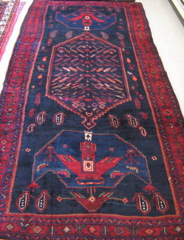 Appraisal: PERSIAN TRIBAL CARPET northwest Iran hand knotted in geometric boteh