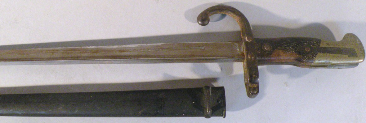 Appraisal: A late thC French bayonet and scabbard with tapering blade