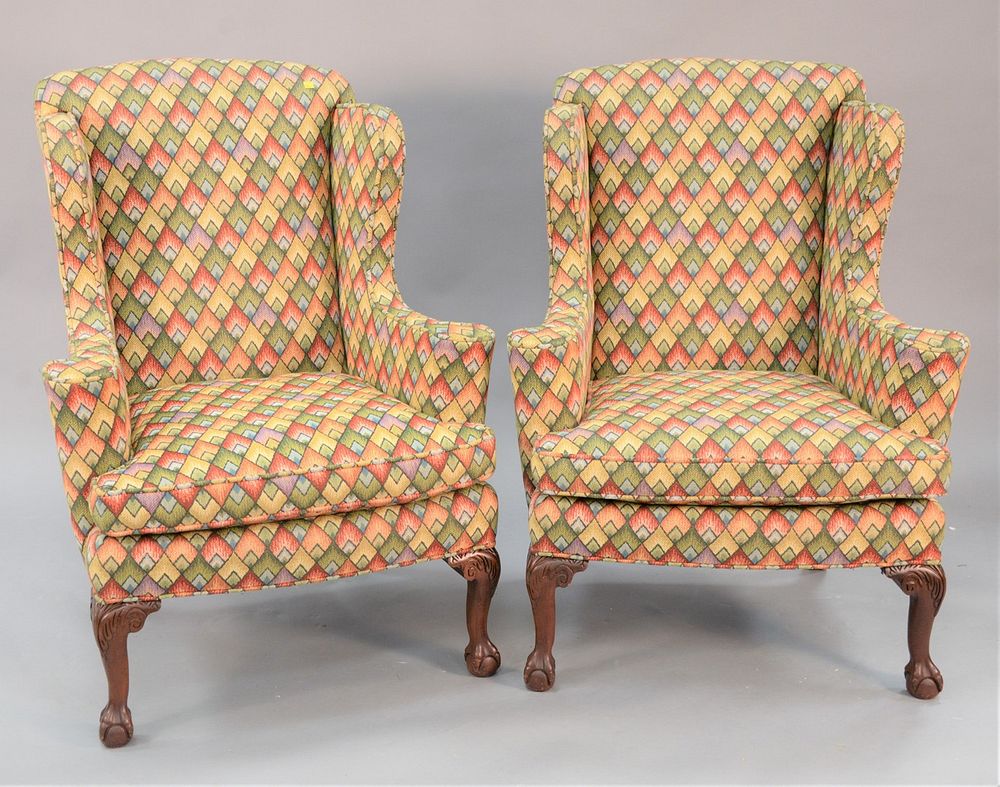 Appraisal: Pair of Chippendale style geometric upholstered wing armchairs ball and