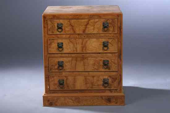 Appraisal: GEORGIAN STYLE BURL WALNUT SILVER CHEST Four drawers with cockbeading