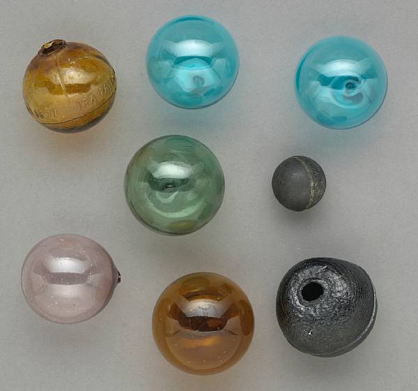 Appraisal: A lot of eight target balls Comprising Amber ball marked