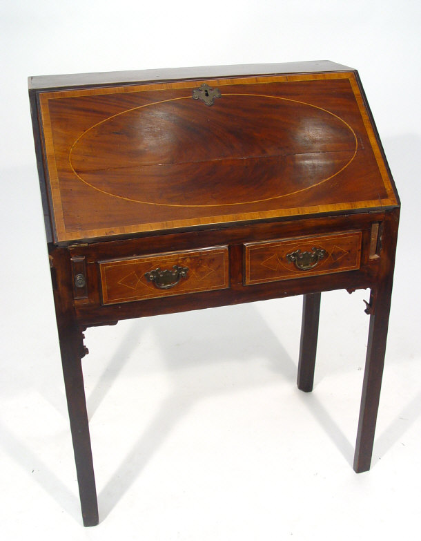 Appraisal: Georgian mahogany bureau with oval strung inlay and cross banded