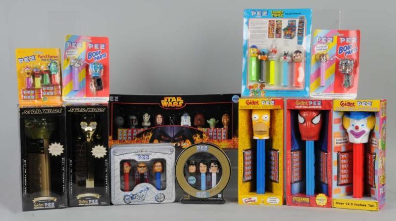 Appraisal: Box Lot of Pez Dispensers Description Includes pez related games