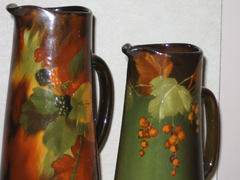 Appraisal: WELLER ZANESVILLE OHIO Two Louwelsa glazed pottery pitchers each incised