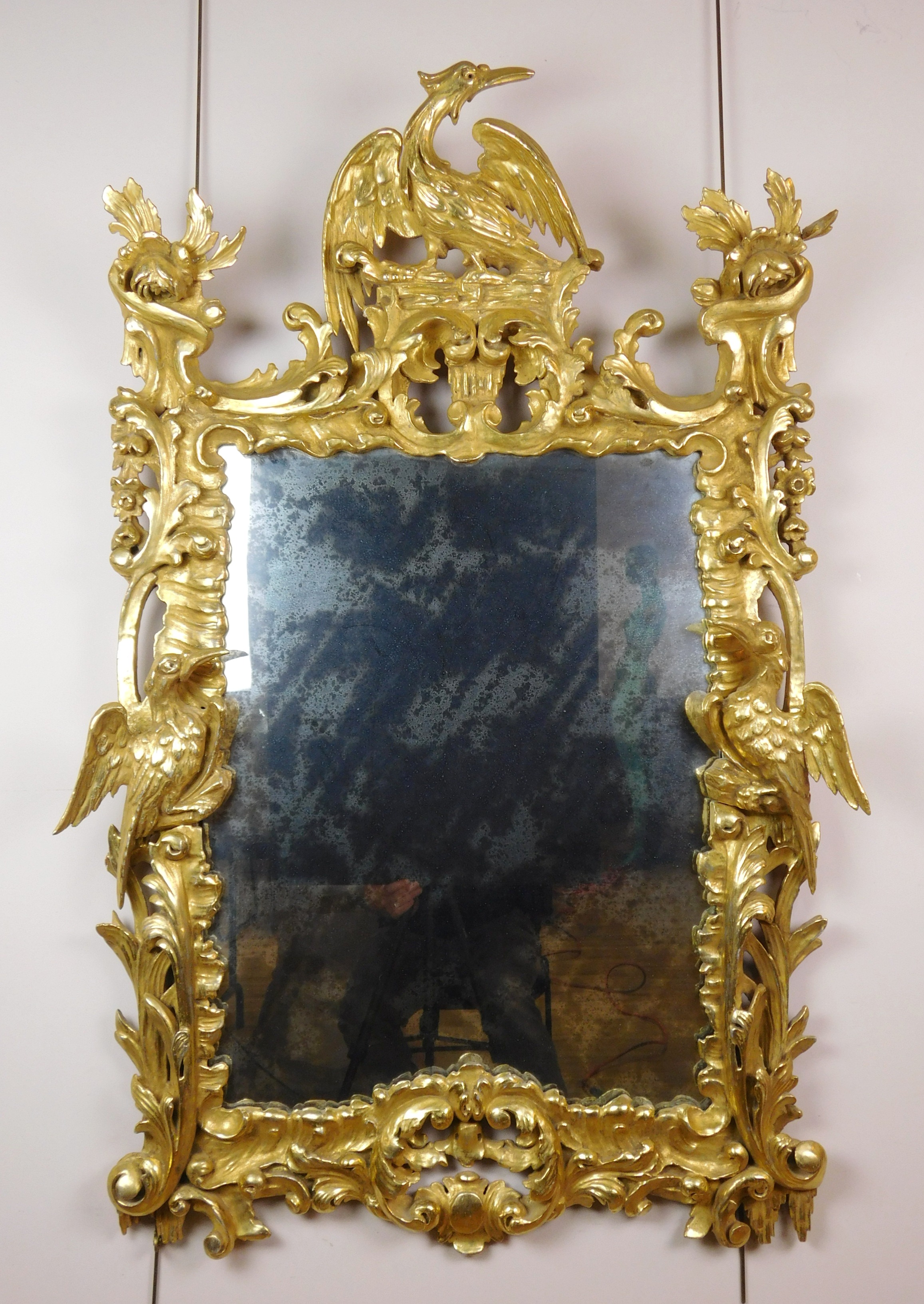 Appraisal: th c Rococo carved and gilded wall mirror ca with