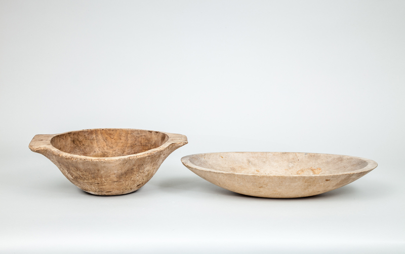 Appraisal: SCOOPED WOOD OVAL BOWL AND A TWO-HANDLED WOOD BOWL and