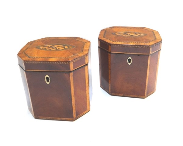 Appraisal: A pair of George III mahogany canted rectangular inlaid tea