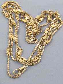 Appraisal: A Victorian yellow metal tests ct gold long guard chain