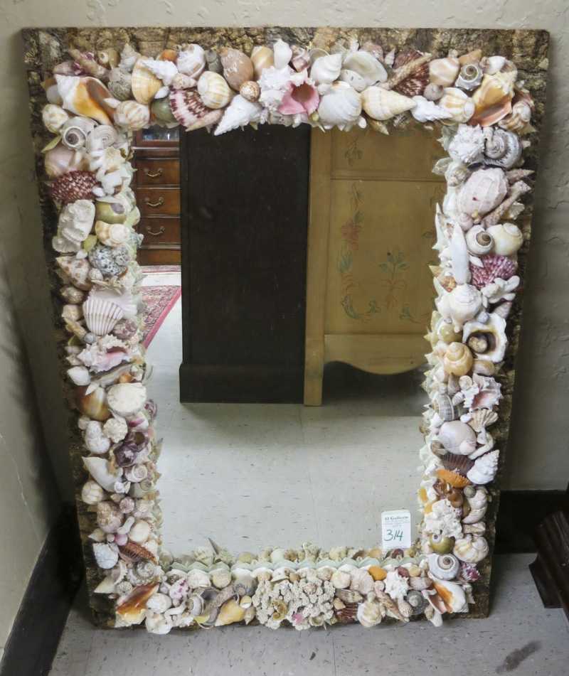 Appraisal: SEASHELL FRAMED WALL MIRROR of rectangular form including shells coral