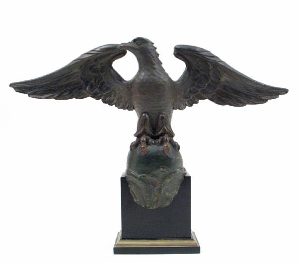 Appraisal: A Continental carved and painted wood figure of an eagle