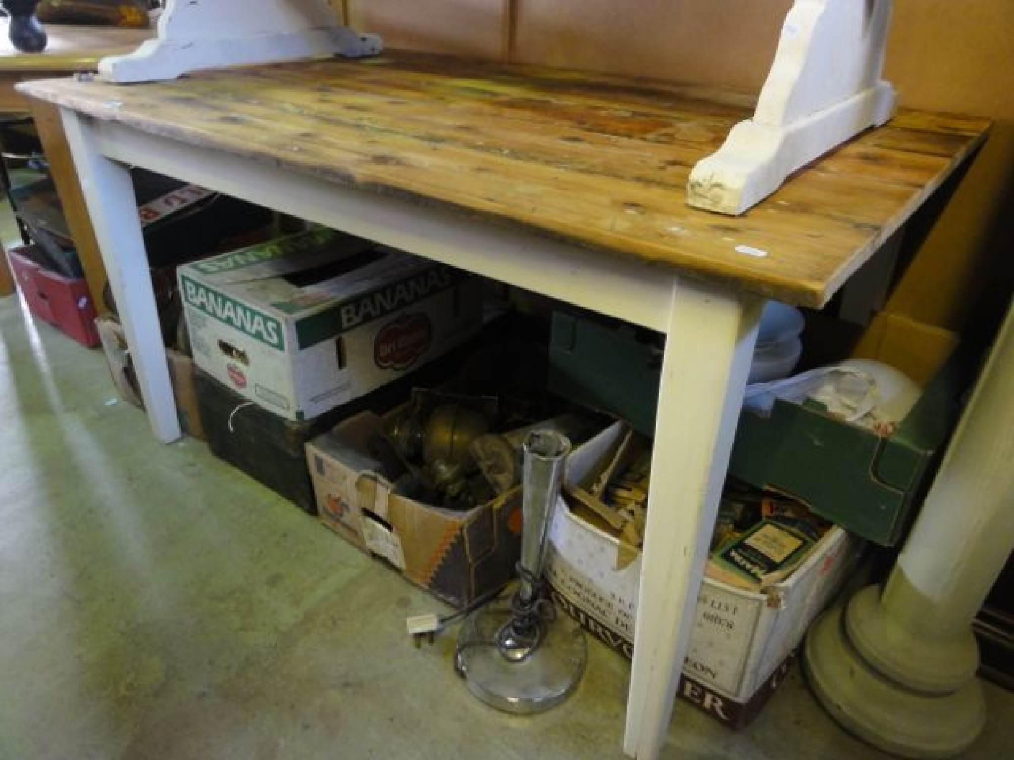 Appraisal: A kitchen table the rectangular stripped pine plank top raised