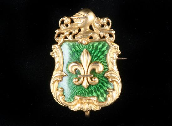 Appraisal: VICTORIAN K YELLOW GOLD AND GREEN GUILLOCHE ENAMEL PIN-BACK PENDANT