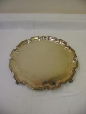 Appraisal: A TRAY of circular form with moulded Chippendale border raised