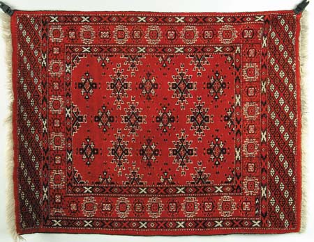 Appraisal: SMALL ORIENTAL MODERN MAT Colors of red white and black