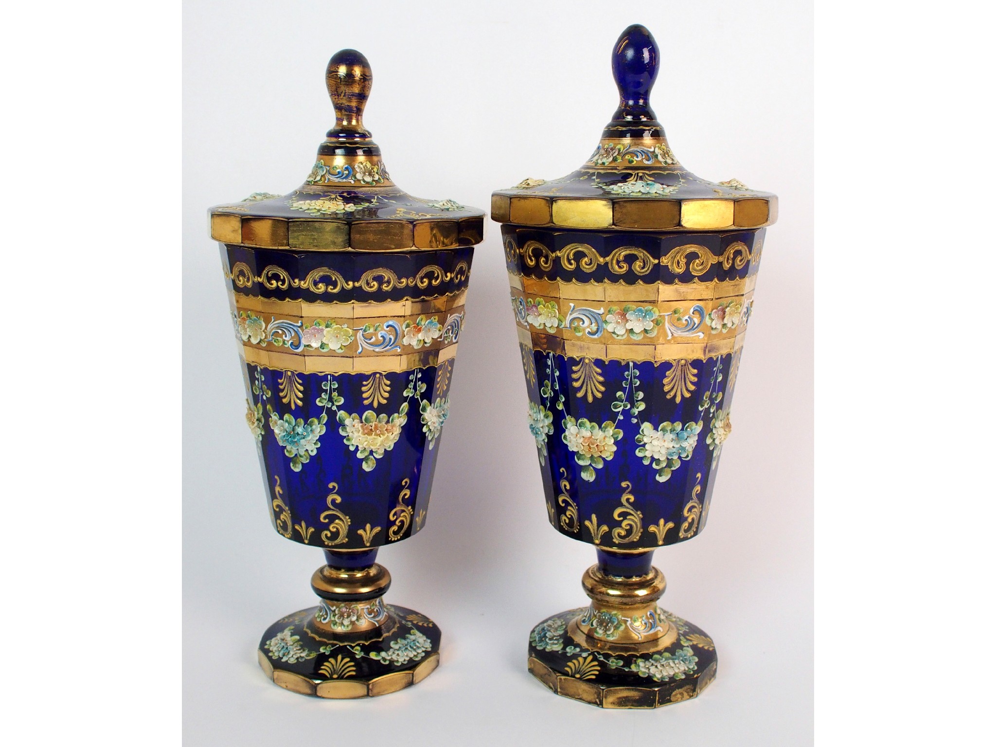 Appraisal: A pair of antique Bohemian blue glass urnsthe classical urn