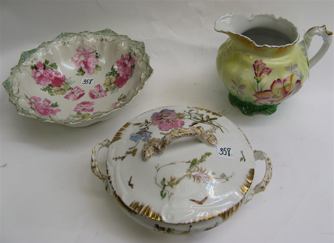 Appraisal: THREE DECORATIVE PORCELAIN TABLE ITEMS covered vegetable bowl D Austrian