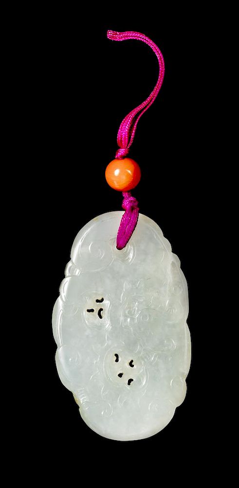 Appraisal: A White Jade Carved Cloud and Chilong Pendant Length inches