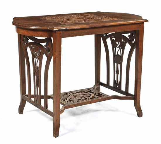 Appraisal: A Continental Art Nouveau Carved Mahogany Occasional Table the rectangular