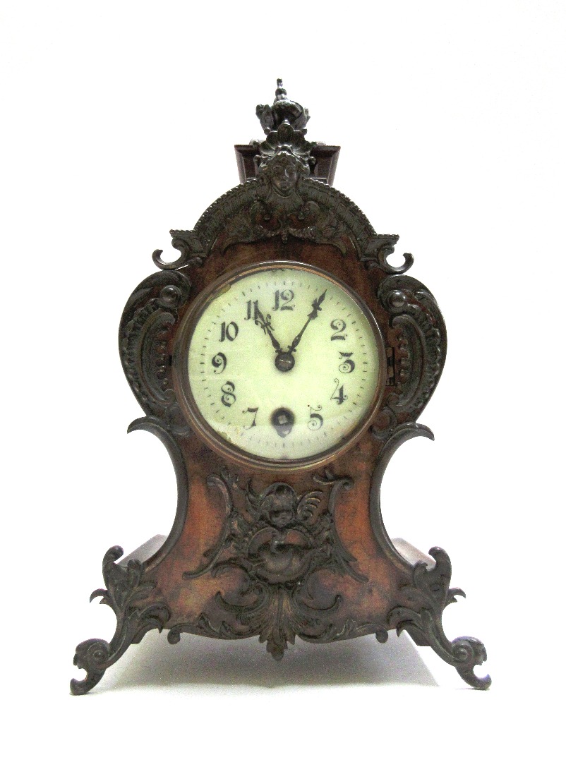 Appraisal: A German walnut cased mantel timepiece late th early th