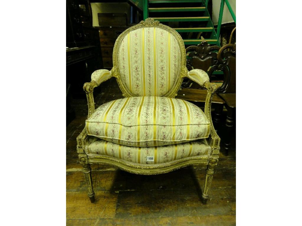 Appraisal: An th century French open armchair with floral upholstered serpentine