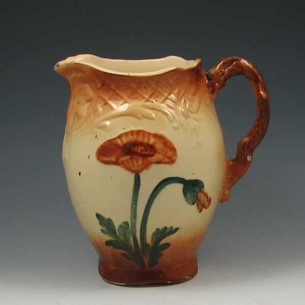 Appraisal: Roseville Utility Flower Pitcher unmarked ''h several chips around the