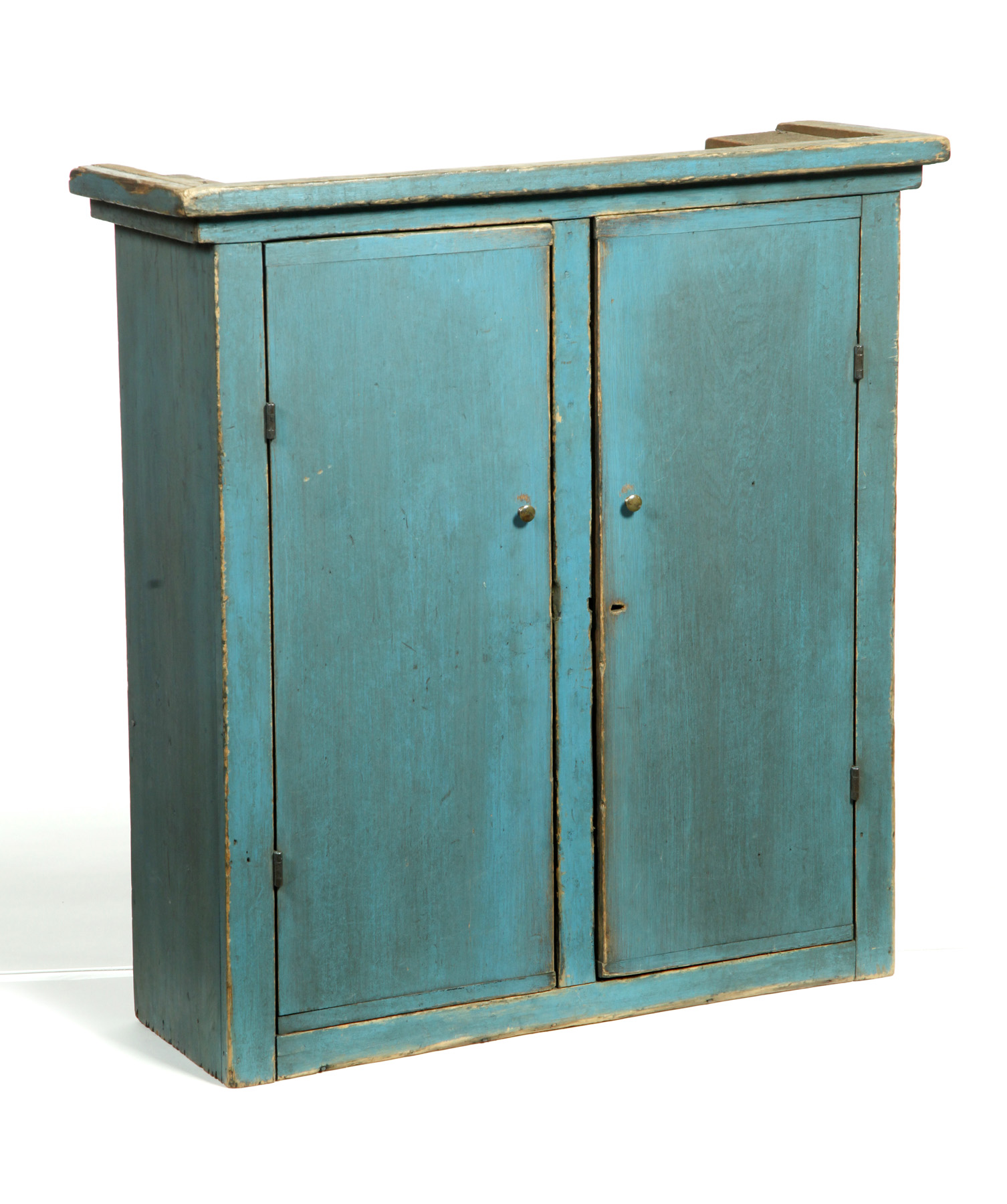 Appraisal: AMERICAN PAINTED HANGING CUPBOARD Nineteenth century pine Breadboard doors and