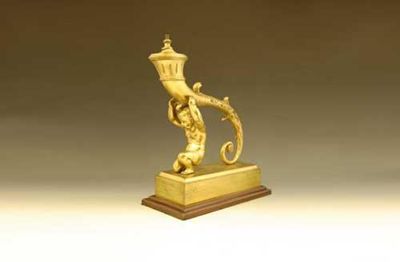 Appraisal: A th century ormolu lamp base modelled as a putto