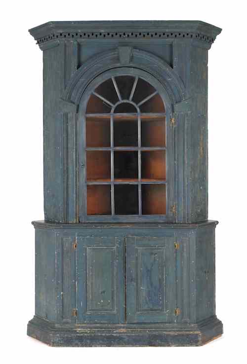 Appraisal: Pennsylvania architectural painted pine corner cupboard ca retaining its original