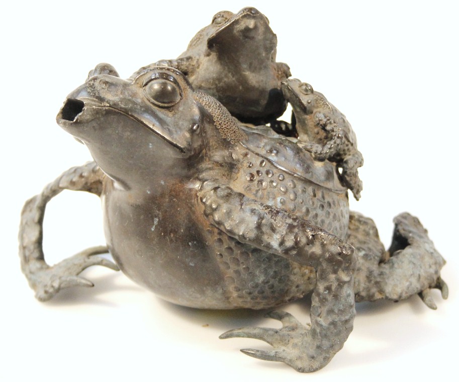 Appraisal: A Japanese bronze figure of a toad with two further