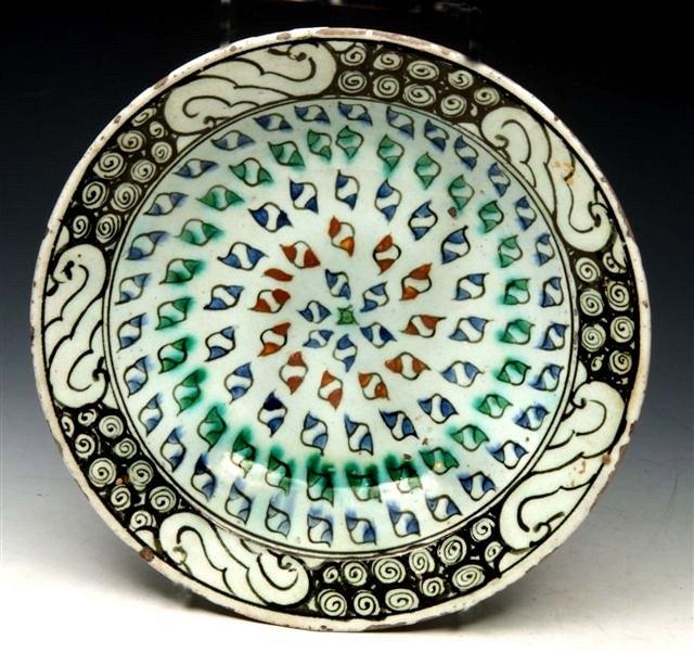 Appraisal: A TH CENTURY IZNIK POTTERY DISH with concentric circles of