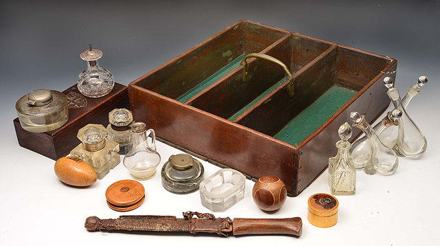 Appraisal: A GEORGIAN MAHOGANY THREE DIVISIONAL CUTLERY BOX with brass carrying