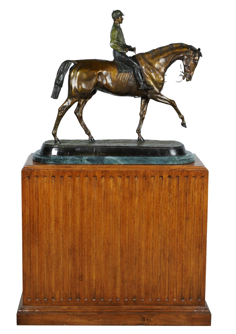 Appraisal: AFTER PJ MENE JOCKEY HORSEbronze with green brown and light