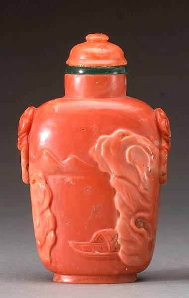 Appraisal: A coral snuff bottle Of flattened baluster form with an