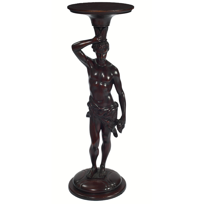 Appraisal: Carved figural pedestal in mahogany depicts a hunter refinished dia