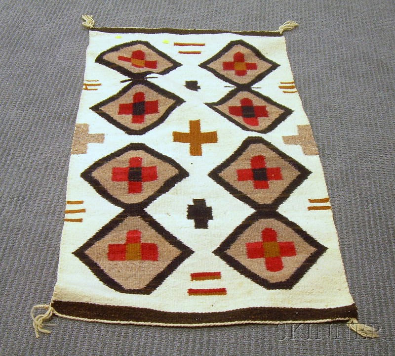 Appraisal: Navajo Rug brown white and red in geometric patterns lg