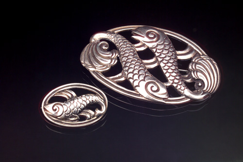 Appraisal: TIFFANY CO MAKERS Two Leaping Fish brooches in the Scandinavian