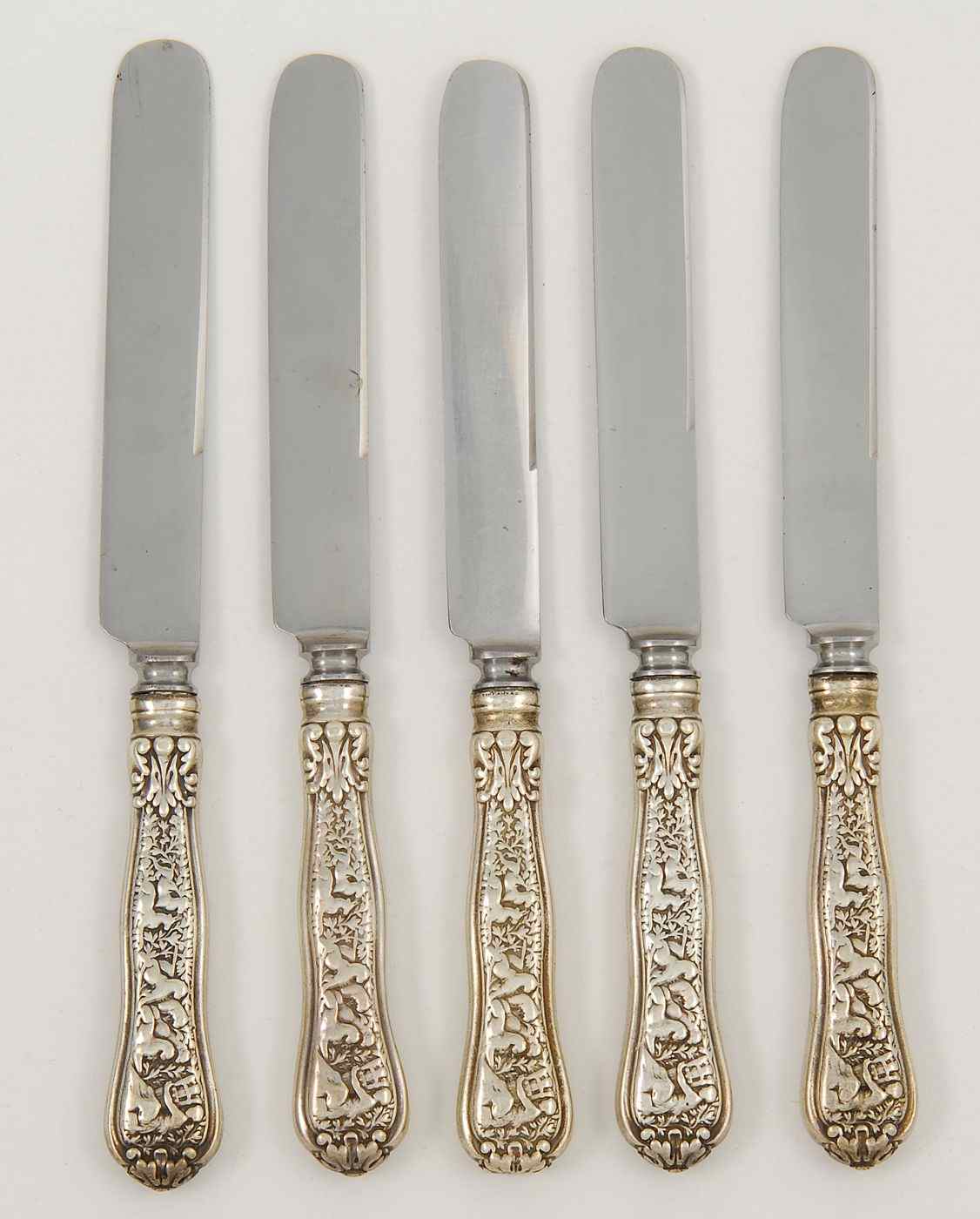 Appraisal: FIVE TIFFANY STERLING SILVER HOLLOW-HANDLED LUNCHEON KNIVESIn the Olympian'' pattern