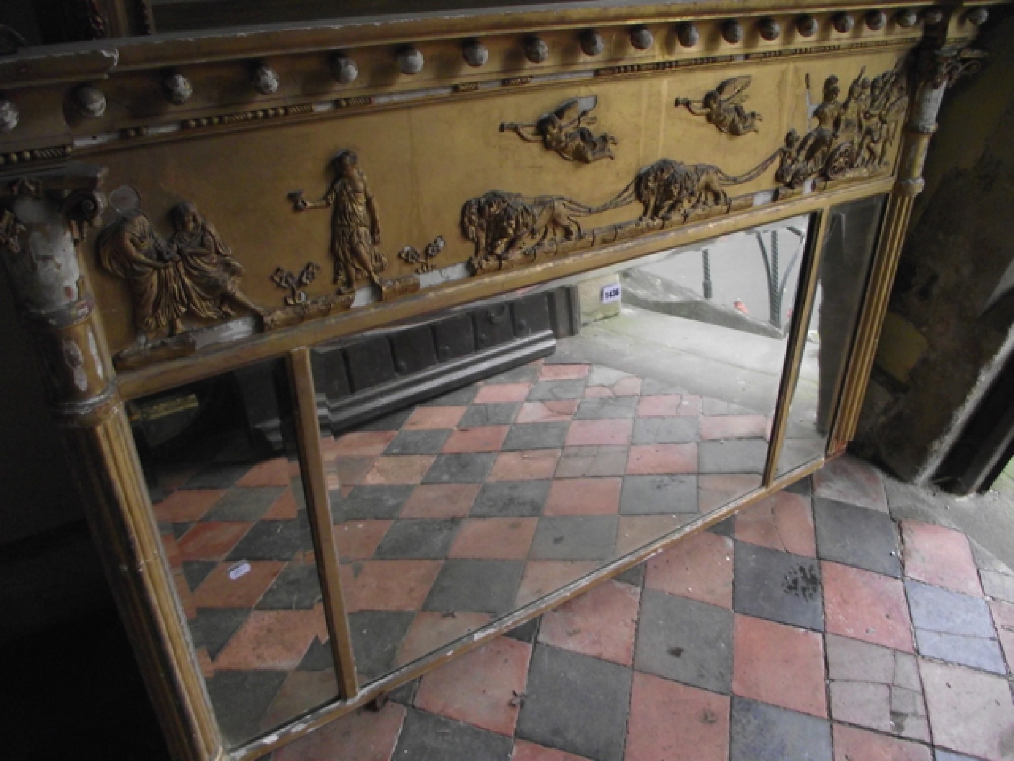 Appraisal: An early th century classical style overmantle mirror incorporating three