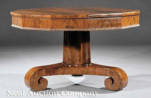 Appraisal: An American Late Classical Mahogany Low Table c ripple molded