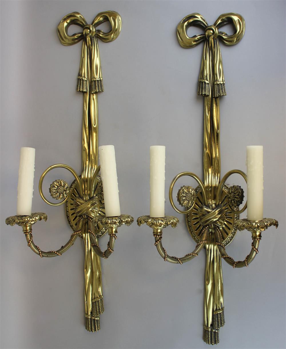 Appraisal: PAIR OF LOUIS XVI STYLE CAST BRASS TWO-LIGHT SCONCES modeled