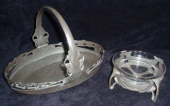 Appraisal: A Liberty pewter basket with pierced sides and a cross