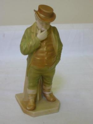 Appraisal: A ROYAL WORCESTER IVORY PORCELAIN FIGURE John Bull modelled standing