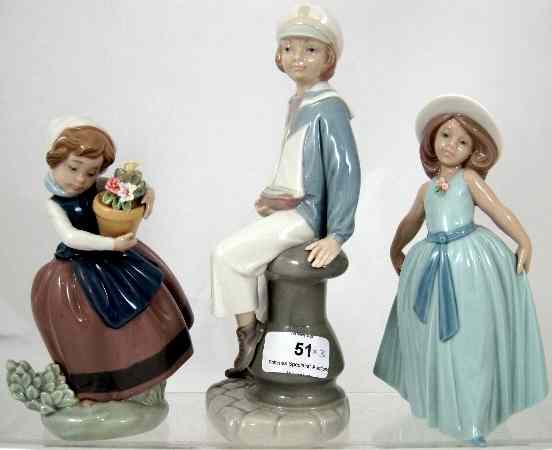 Appraisal: Lladro figures of a Sailor Boy Girl with Flowers and